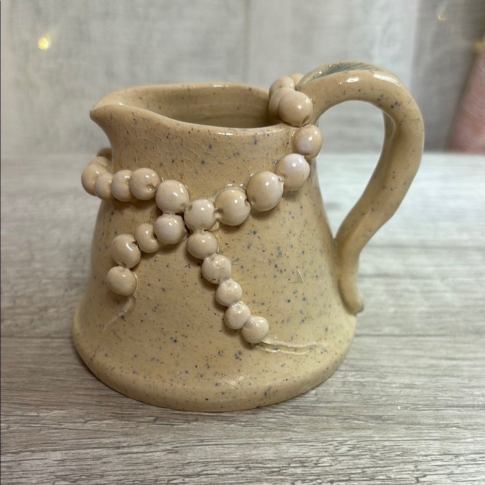 Elegant Tan Ceramic Creamer with Beaded Design